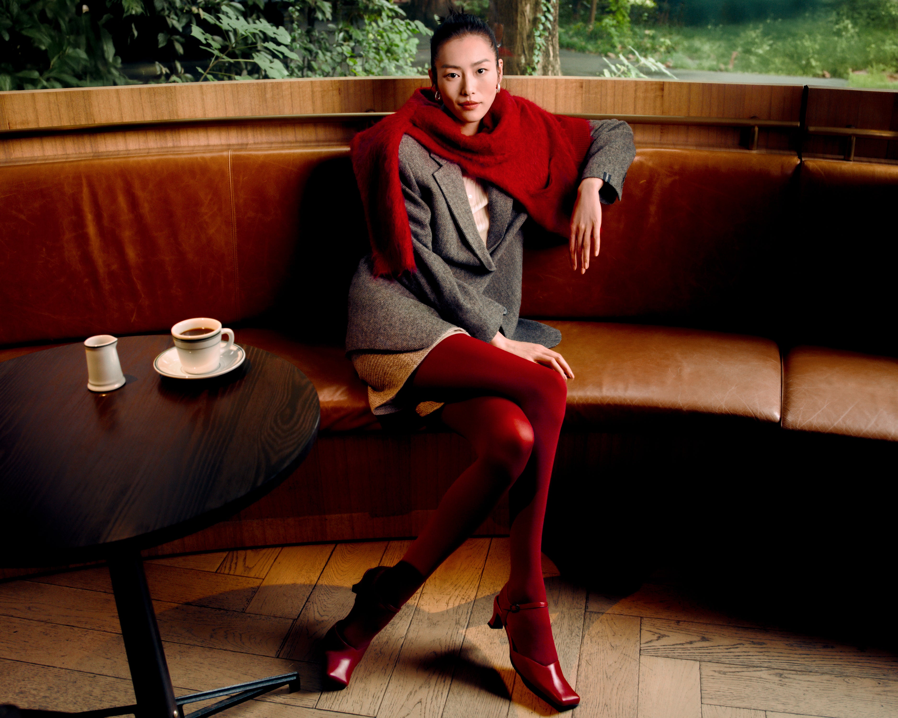 DAZZLE campaign portrait in a classic cafe setting
